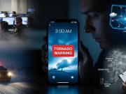 Department of Public Safety Emergency Alerts, Real-Time Notifications & Resources in the USA Department of Public Safety emergency alert on smartphone with stormy sky background