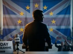 Move to rejoin EU among options for UK A symbolic political image showing Andy Burnham at a podium with the EU flag and Union Jack in the background, representing the debate over the UK rejoining the European Union.