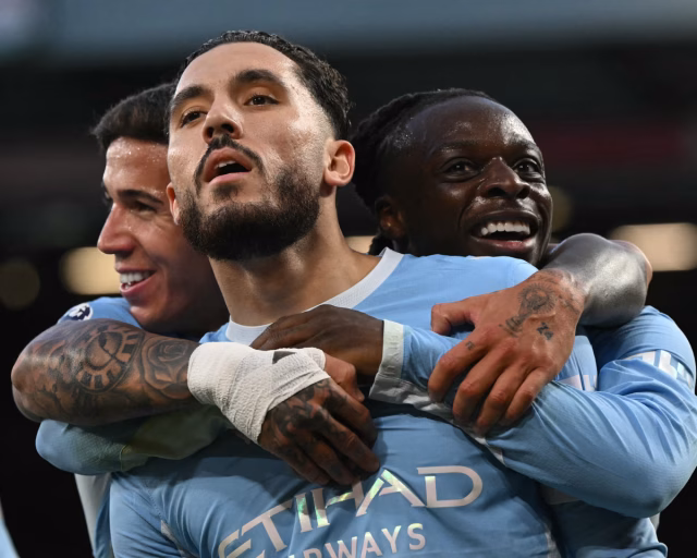 Manchester City Overcome Anfield Hostility to Sink Ten-Man Liverpool